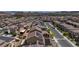 High angle shot of a residential area with many houses equipped with solar panels at 242 Polaris Ridge Ave, Henderson, NV 89011