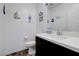 Charming half bathroom decorated with beach-themed decor and a modern vanity at 242 Polaris Ridge Ave, Henderson, NV 89011