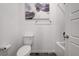 White toilet with a bathtub and shower nearby at 242 Polaris Ridge Ave, Henderson, NV 89011