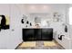 Elegant primary bathroom features a double vanity, soaking tub, and a separate shower at 242 Polaris Ridge Ave, Henderson, NV 89011