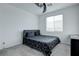 Bedroom features carpet flooring, queen bed and window at 242 Polaris Ridge Ave, Henderson, NV 89011