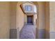 Inviting front entrance with a brick pathway leading to a double door under an arched portico at 242 Polaris Ridge Ave, Henderson, NV 89011