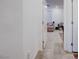 Hallway with a view of a living room area and access to additional rooms at 242 Polaris Ridge Ave, Henderson, NV 89011