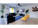 Inviting living space with contemporary furnishings and decor, perfect for relaxing and entertaining in style and comfort at 242 Polaris Ridge Ave, Henderson, NV 89011