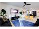 Open-concept living space with seamless flow, showcasing stylish decor and ample room for comfortable living and entertaining at 242 Polaris Ridge Ave, Henderson, NV 89011