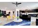Open living area blends dining, kitchen, and living spaces for easy entertaining and modern, connected living at 242 Polaris Ridge Ave, Henderson, NV 89011