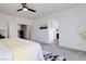 Comfortable primary bedroom offering ample space, neutral tones, and easy access to the en suite bath at 242 Polaris Ridge Ave, Henderson, NV 89011