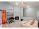 Cozy living room space showcasing a fireplace, recessed lighting, neutral wall paint, and wood-look floors at 2421 Sunrise Springs Ct, North Las Vegas, NV 89031