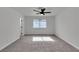 Bedroom featuring a ceiling fan, a window that brings in natural light and carpet flooring at 2461 Old Forge Ln # 103, Las Vegas, NV 89121