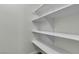 A closet with white shelving with great storage space at 2461 Old Forge Ln # 103, Las Vegas, NV 89121