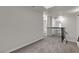 Open second-story loft area overlooking staircase at 2461 Old Forge Ln # 103, Las Vegas, NV 89121