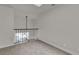 Second story loft area with iron railing overlooking outdoor ceiling fan at 2461 Old Forge Ln # 103, Las Vegas, NV 89121