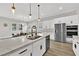 Kitchen featuring a large island, stainless appliances, and an adjacent dining area at 2654 Summit Springs St, Henderson, NV 89044