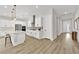 Contemporary kitchen with a center island, stainless steel appliances, and sleek flooring at 2654 Summit Springs St, Henderson, NV 89044