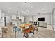 Spacious open concept living area with dining, kitchen and living room with sofa at 2654 Summit Springs St, Henderson, NV 89044