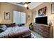 Comfortable bedroom featuring stylish decor and natural light at 2939 Crown Bluffs Ct, Las Vegas, NV 89117