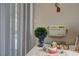 Close up of a desk and shelves area with a window overlooking the back yard at 2939 Crown Bluffs Ct, Las Vegas, NV 89117