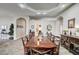 Bright dining room with large table, neutral walls, and lovely decorative details at 2939 Crown Bluffs Ct, Las Vegas, NV 89117