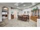 Formal dining room with tile flooring, recessed lighting, and an arched entry at 2939 Crown Bluffs Ct, Las Vegas, NV 89117