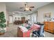 Expansive open floor plan with an office, dining area, and ample natural light at 2939 Crown Bluffs Ct, Las Vegas, NV 89117