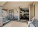 Outdoor patio with seating opening to the kitchen at 2939 Crown Bluffs Ct, Las Vegas, NV 89117