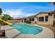 Pool features built-in spa, providing a relaxing and fun backyard experience at 2939 Crown Bluffs Ct, Las Vegas, NV 89117