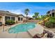 Backyard pool with a slide and jacuzzi at 2939 Crown Bluffs Ct, Las Vegas, NV 89117