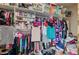 Organized walk-in closet featuring ample shelving and hanging space for clothes, shoes, and accessories at 2939 Crown Bluffs Ct, Las Vegas, NV 89117