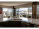 Modern kitchen with a view of the city at 3111 Bel Air Dr # 15G, Las Vegas, NV 89109
