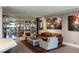 A stylish living room features unique shelving and colorful artwork at 3111 Bel Air Dr # 15G, Las Vegas, NV 89109