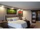 Comfortable bedroom features recessed lights, wood furnishings, decor, and a private closet at 3111 Bel Air Dr # 15G, Las Vegas, NV 89109