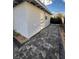 Modern hardscape backyard with new white stucco and black gate at 321 Beaumont St, Las Vegas, NV 89106