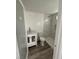 Bathroom featuring a glass door shower, modern sink, vanity and toilet at 321 Beaumont St, Las Vegas, NV 89106