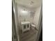 Cozy bathroom featuring a vanity, toilet, and ventilation fan at 321 Beaumont St, Las Vegas, NV 89106