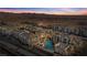 Aerial view of condo community with swimming pool, parking and mountain views at 3550 Bay Sands Dr # 1003, Laughlin, NV 89029
