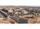 Aerial view showcasing a desert community featuring well-maintained condo buildings, and palm trees at 3550 Bay Sands Dr # 1003, Laughlin, NV 89029