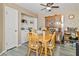 Bright dining area boasts a wooden table, chairs, and a charming hutch, adjacent to convenient laundry facilities at 3550 Bay Sands Dr # 1003, Laughlin, NV 89029