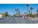 Welcoming entrance to the community, lined with palm trees and mature landscaping at 3550 Bay Sands Dr # 1003, Laughlin, NV 89029