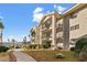 Exterior view of condo buildings with private balconies and desert landscaping on a sunny day at 3550 Bay Sands Dr # 1003, Laughlin, NV 89029