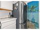 Sleek refrigerator and cabinetry, creating a clean and efficient kitchen space at 3550 Bay Sands Dr # 1003, Laughlin, NV 89029
