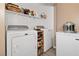 Well-equipped laundry room featuring modern appliances and ample storage space for convenience at 3550 Bay Sands Dr # 1003, Laughlin, NV 89029