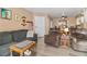 Comfortable living room with plush seating, ceiling fan, and laminate flooring at 3550 Bay Sands Dr # 1003, Laughlin, NV 89029