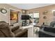Comfortable living room with sliding door to balcony with neutral color scheme at 3550 Bay Sands Dr # 1003, Laughlin, NV 89029