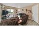 Cozy living room with sliding glass door to patio and comfortable furniture at 3550 Bay Sands Dr # 1003, Laughlin, NV 89029