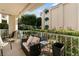 Relax on the patio with comfortable seating and views of the surrounding greenery and building at 3550 Bay Sands Dr # 1003, Laughlin, NV 89029