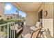 Spacious patio features comfortable seating with views of palm trees and surrounding neighborhood at 3550 Bay Sands Dr # 1003, Laughlin, NV 89029