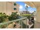 Enjoy outdoor living on this patio with comfortable seating and views of palm trees and the neighborhood at 3550 Bay Sands Dr # 1003, Laughlin, NV 89029