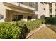 Exterior view of condo patio with green landscaping at 3550 Bay Sands Dr # 1003, Laughlin, NV 89029