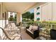 Enjoy the view from the patio featuring comfortable seating and lush landscaping at 3550 Bay Sands Dr # 1003, Laughlin, NV 89029