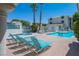 Enjoy the sunshine with this complex's pool and hot tub with lounge chairs and mature landscaping at 3550 Bay Sands Dr # 1003, Laughlin, NV 89029